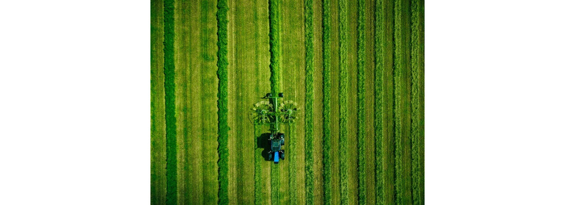 https://www.funkyreaders.co.uk/image/cache/catalog/a%20Licensed%20images/aerial-view-of-tractor-mowing-green-field-in-finla-2022-02-08-22-39-29-utc-1120x400.jpg